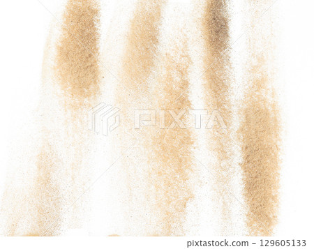 Sand flying explosion, Golden sand wave explode. Abstract sands cloud fly. Yellow colored sand splash throwing in Air. White background Isolated high speed shutter, throwing freeze stop motion Sand flying explosion, Golden sand wave explode. Abstract sands cloud fly. Yellow colored sand splash throwing in Air. White background Isolated high speed shutter, throwing freeze stop motion 129605133