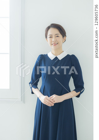 Portrait of a middle-aged woman Portrait of a middle-aged woman 129605736