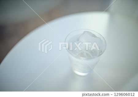 Glass with water 129606012