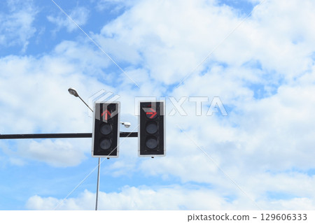 traffic light on beautiful blue sky and white cloud, nature scene in the city traffic light on beautiful blue sky and white cloud, nature scene in the city 129606333