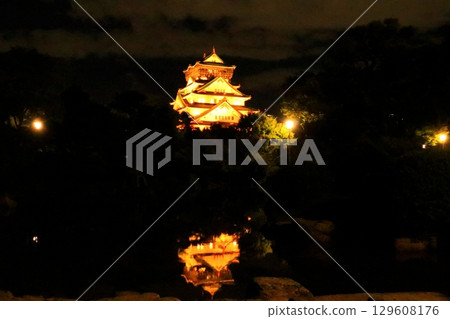 Osaka Castle illuminated at night 129608176
