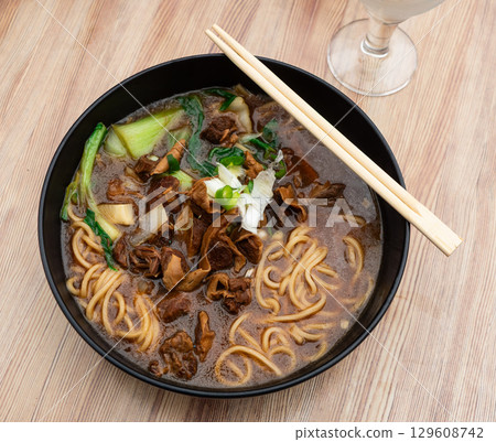 Soup with pasta and boiled beef tenderloin is traditional Chinese cuisine dish Soup with pasta and boiled beef tenderloin is traditional Chinese cuisine dish 129608742