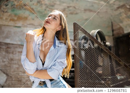 Photo of sensual young woman in abandoned house Photo of sensual young woman in abandoned house 129608781