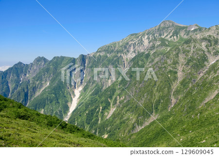 View of the ridgeline leading to Mt. Kasagatake and Mt. Shakujo from Shakushidaira in the Northern Alps View of the ridgeline leading to Mt. Kasagatake and Mt. Shakujo from Shakushidaira in the Northern Alps 129609045