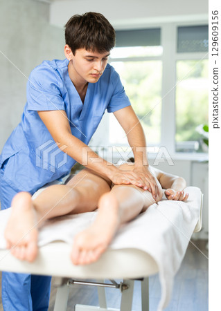 Rehabilitation course leg massage 129609156