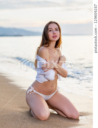 Woman in bikini enjoying tropical beach and caribbean summer vacation 129609287