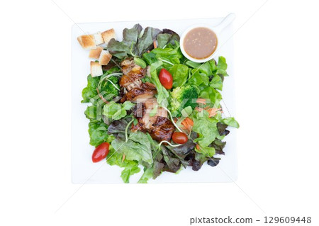 Grilled chicken salad with vegetables	 Grilled chicken salad with vegetables	 129609448