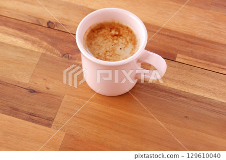 An image of relaxing while brewing a cafe latte, a coffee with plenty of milk An image of relaxing while brewing a cafe latte, a coffee with plenty of milk 129610040