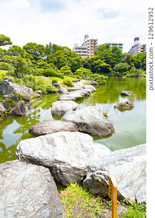 Kiyosumi Garden in early summer - Crossing the rocks 129612952