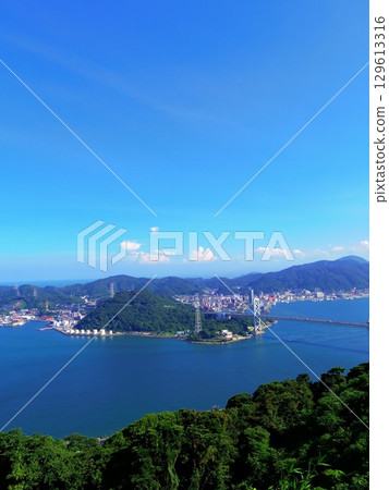 The Kanmon Straits as seen from the Hinoyama Park Observatory (Shimonoseki City, Yamaguchi Prefecture) 129613316
