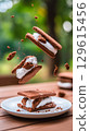Delicious Smores Being Made With Marshmallows And Chocolate Cookies. 129615456