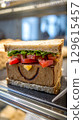 A Deliciously Happy Sandwich Ready to Enjoy and Eat. 129615457
