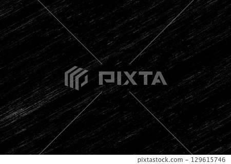 A hard-looking black texture with diagonal scratches 129615746