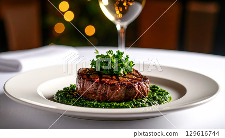 a perfectly grilled steak topped with vibrant chimichurri sauce, showcasing juicy texture, charred grill marks, and rich flavors in a mouthwatering gourmet presentation 129616744