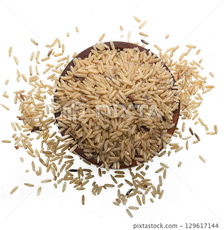 Brown rice in wooden bowl isolated on white background. 129617144