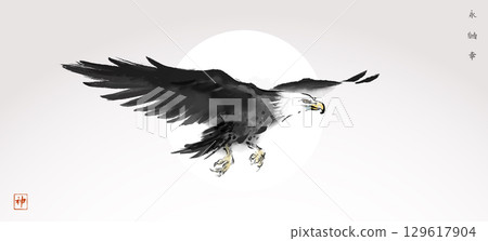 Ink wash painting of an eagle in flight. Traditional oriental ink painting sumi-e. Hieroglyphs - eternity, freedom, happiness, spirit 129617904