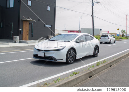 Sedan PHEV road driving Sedan PHEV road driving 129618008