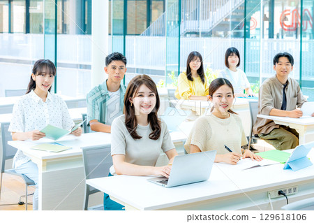 University students taking classes 129618106