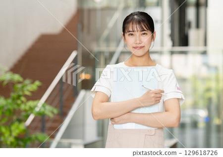 Young woman working in clinic 129618726