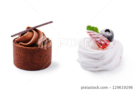 Two elegant dessert creations displaying chocolate and meringue textures Two elegant dessert creations displaying chocolate and meringue textures 129619296