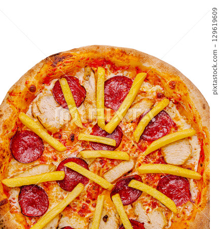 Delicious pizza topped with pepperoni, chicken, and french fries for lunch Delicious pizza topped with pepperoni, chicken, and french fries for lunch 129619609