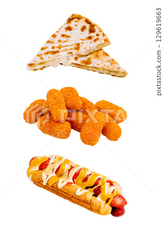 Tasty platter with cheese quesadilla, chicken nuggets, and hot dog 129619663