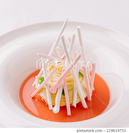 Delicate dessert creation with floral design and striking presentation Delicate dessert creation with floral design and striking presentation 129619732