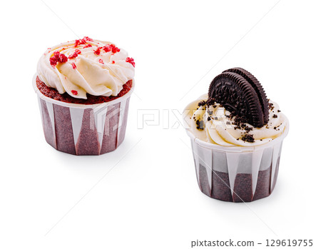 Delicious red velvet and cookies and cream cupcakes displayed together Delicious red velvet and cookies and cream cupcakes displayed together 129619755