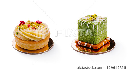Delicious desserts displayed on golden bases at a bakery showcase 129619816