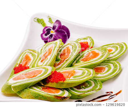 Green Salmon Rolls with Caviar Garnish 129619820