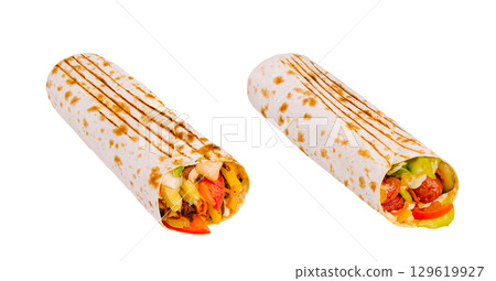 Delicious wraps filled with fresh ingredients ready for a flavorful meal Delicious wraps filled with fresh ingredients ready for a flavorful meal 129619927
