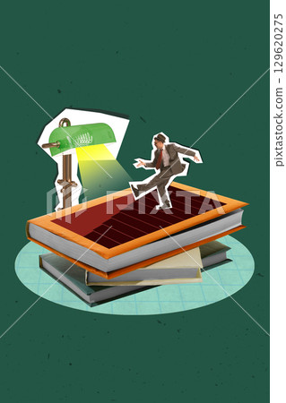 Creative artwork of businessman balancing on book under green desk lamp light 129620275