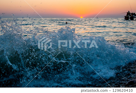Beautiful sunset above sea. Beautiful sunset above sea. 129620410