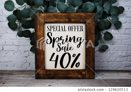 Spring Sale 40% Promotion and Marketing on wooden background Spring Sale 40% Promotion and Marketing on wooden background 129620513