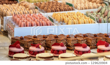 Various assortment of desserts confectionery on the counter in a bakery 129620904