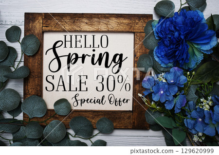 Spring Sale 30% Promotion and Marketing with flowers bouquet decoration on wooden background 129620999