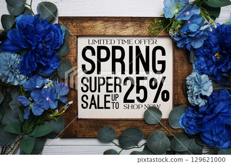 Spring Sale 25% Promotion and Marketing with flowers bouquet decoration on wooden background 129621000
