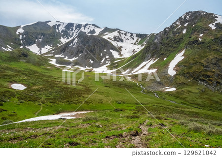 mountain valley with a stream mountain valley with a stream 129621042