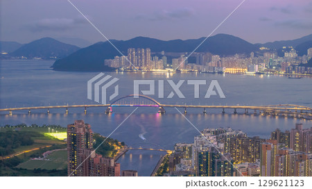 Aug 14 2025 Peaceful waterfront with sea, sky, and buildings 129621123