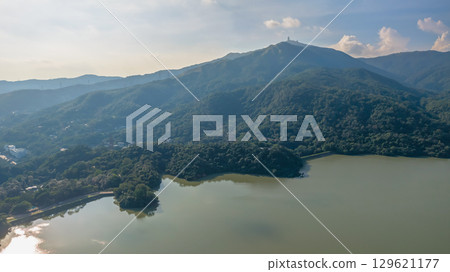 Aug 9 2025 Tranquil waters of scenic Shing Mun Reservoir 129621177