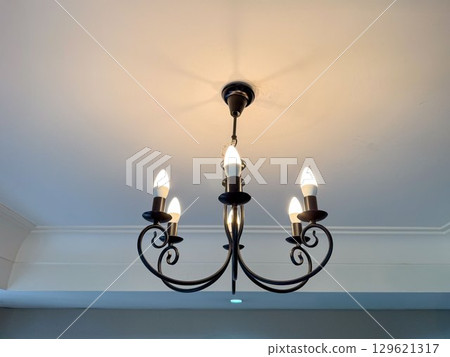 chandelier installed on the ceiling 129621317