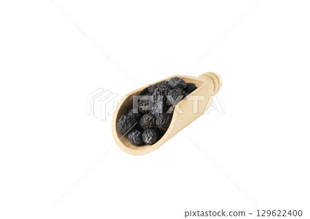 Dried Prunus spinosa, called blackthorn or sloe  in wooden scoop isolated on white background. 129622400