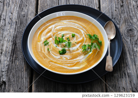 roasted parsnip and carrot soup, top view roasted parsnip and carrot soup, top view 129623159