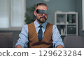 A man is watching holographic screens. 129623284