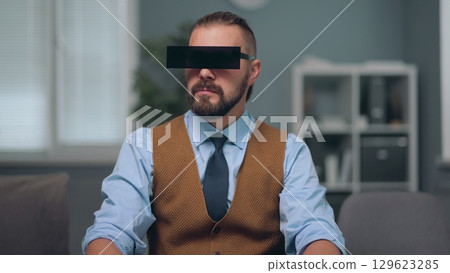 A man is watching holographic screens. A man is watching holographic screens. 129623285