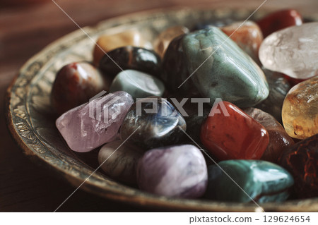 AI image of a background of many natural stones 129624654