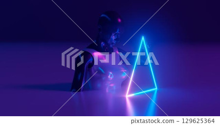 3d rendering. A Moniken girl from a darkly glossy matyal, dressed in bright glossy clothes, holds a glowing neon triangle with her finger on a flat surface. On a deep blue background. 129625364