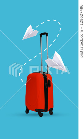 Graphic composition. Red suitcase with paper planes on blue background 129627496