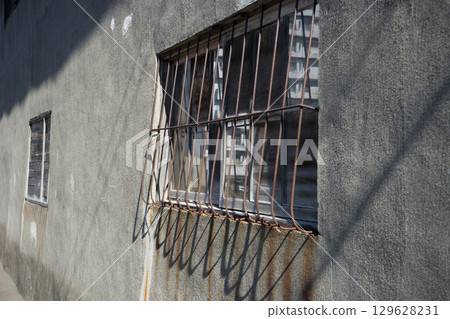 Old warehouse window Old warehouse window 129628231