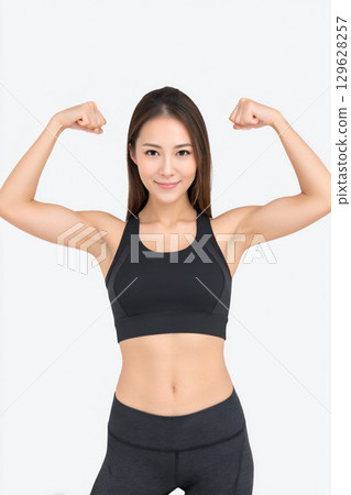 Posing woman in fitness wear 129628257